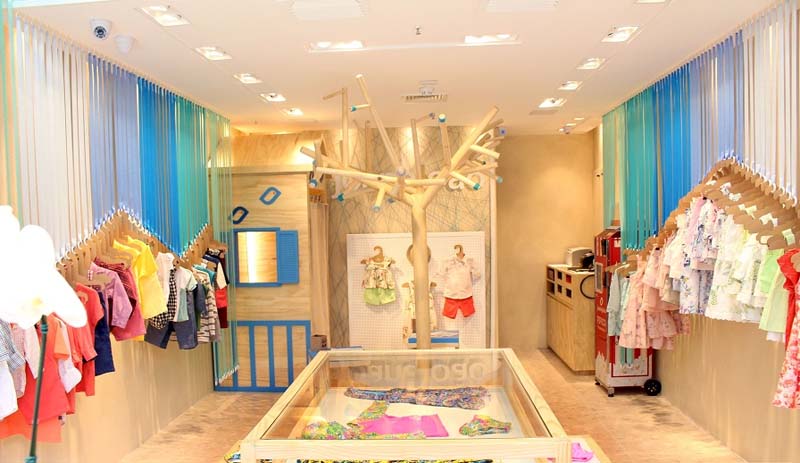 mẫu trang trí shop quần áo trẻ em đẹp - Crystal Design TPL