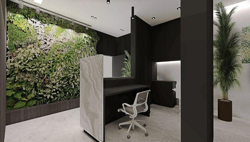 phòng làm việc với bức tường được trang trí cây xanh thoáng mát