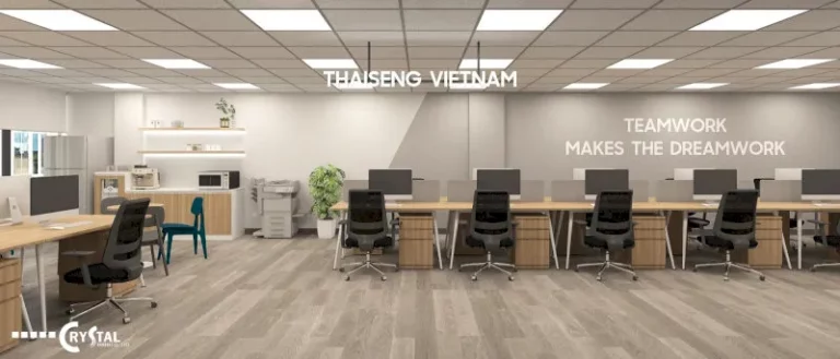 Văn phòng Thaiseng Vietnam với dãy bàn làm việc gỗ, ghế xoay đen và slogan truyền cảm hứng trên tường