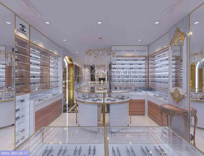 Showroom kính mắt sang trọng, hiện đại với kệ trưng bày sản phẩm được chiếu sáng, sàn nhà bóng và logo Chanel