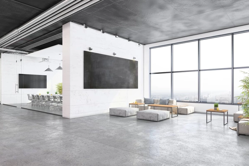 Văn phòng tối giản với tường trắng thuần, bàn gỗ sáng màu và cây xanh nội thất - đơn giản nhưng đầy sức sống (Nguồn: Internet)