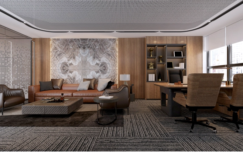 Khu tiếp khách trong phòng lãnh đạo với bộ sofa da màu cognac, bàn cà phê mặt đồng và thảm wool sang trọng (Nguồn: Internet)