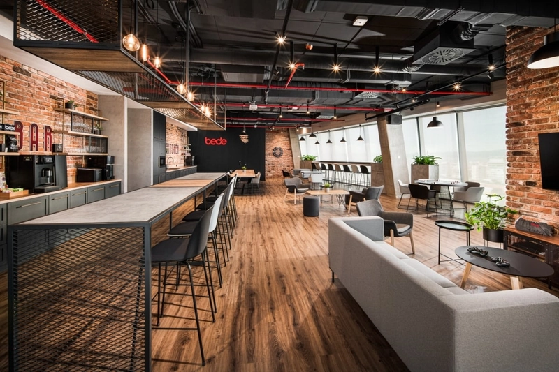 industrial interior design with raw concrete and exposed ceiling