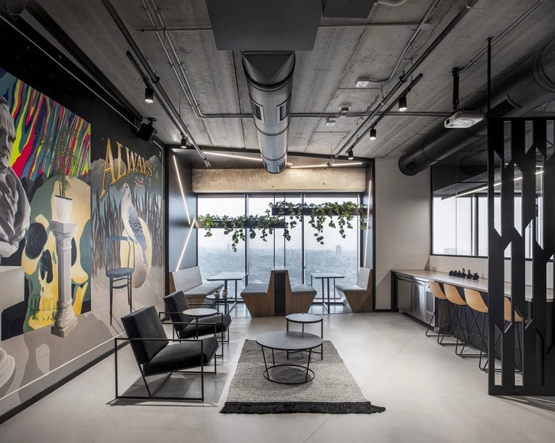 modern office interior design with raw concrete and metal lighting