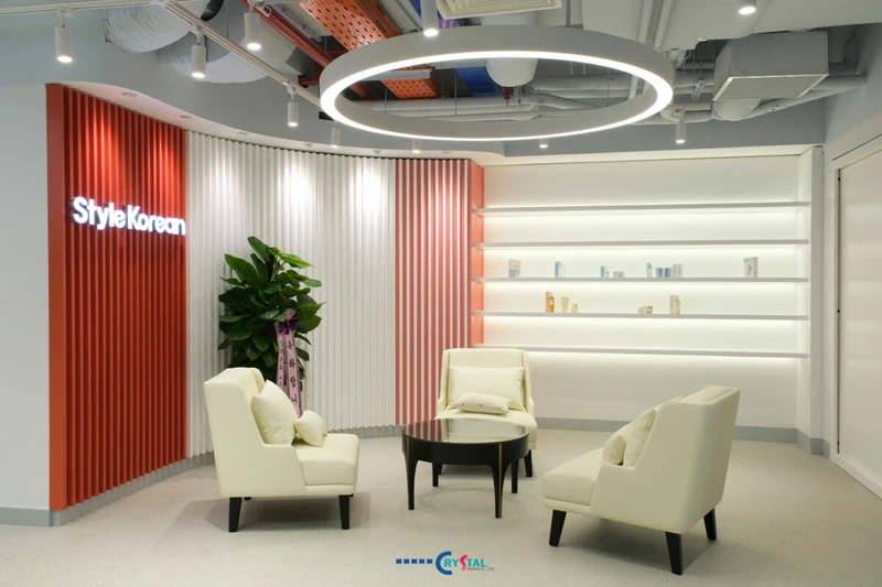 The Style Korean office project by Deco Crystal - An industrial-inspired space where exposed ceilings meet soft contours and ambient glow, creating a modern sense of calm (Source: Deco Crystal) 