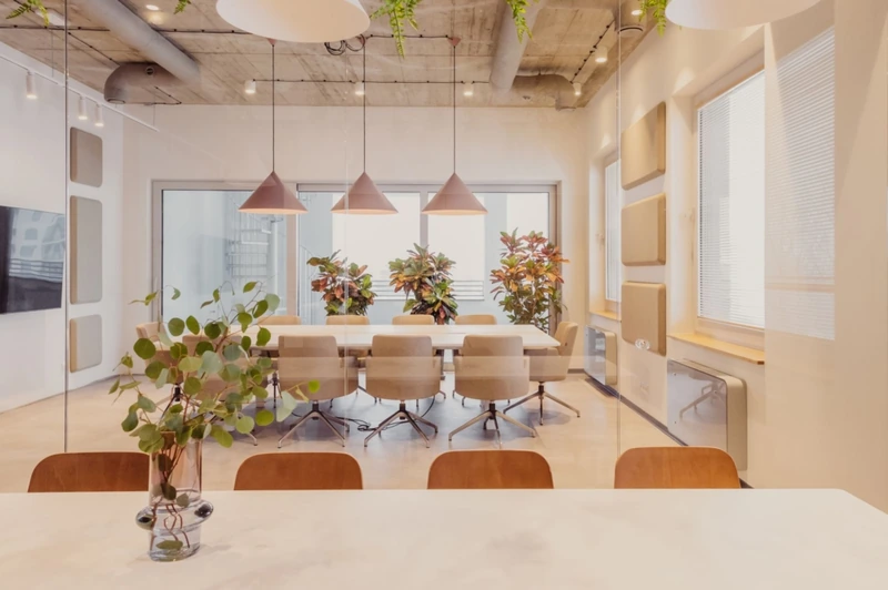 Modern industrial design is incorporating biophilic elements, hanging plants, and warm textures to create spaces that feel habitable rather than sterile (Source: Internet) 