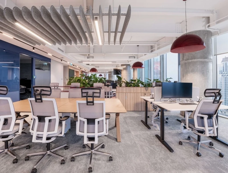 Modular workstation systems and movable dividers can be reconfigured in minutes, allowing the office layout to respond fluidly to evolving project team sizes.