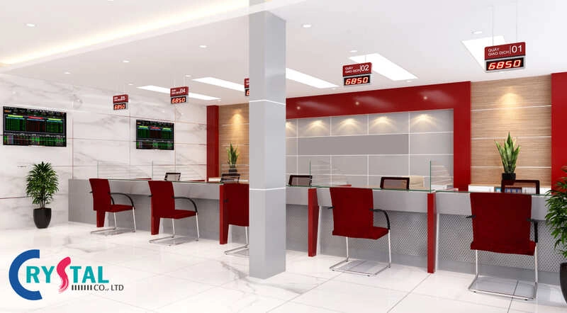Thiết kế văn phòng giao dịch lấy tông đỏ thương hiệu làm điểm nhấn trên nền tường trung tính